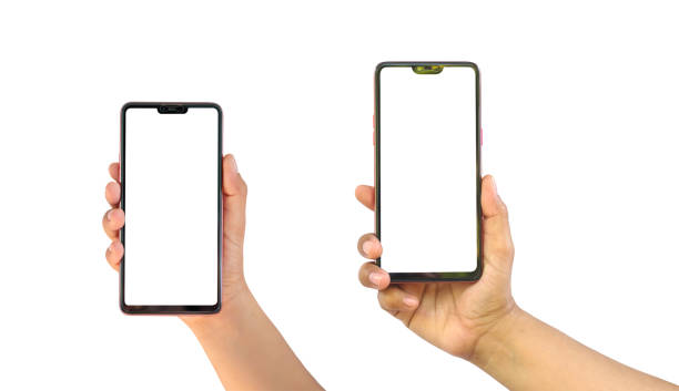 istock Woman hand holding a black smartphone with a blank screen isolated on a white background. 1204643785