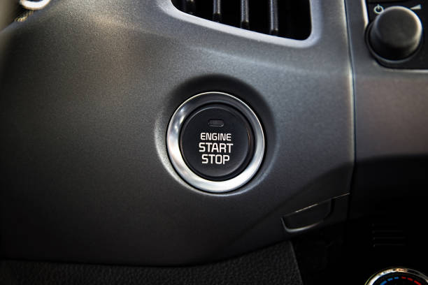 Engine start stop button. Car dashboard.  Auto inside. stock photo