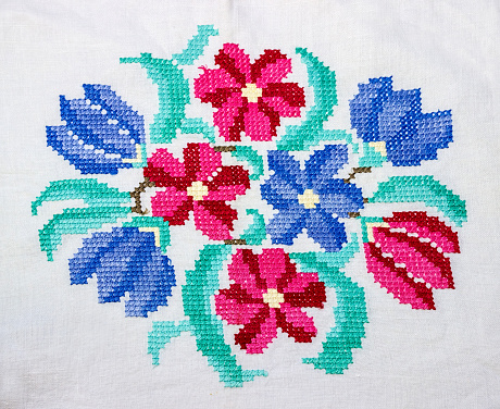 Empty flowers, embroidered with a cross. Folk embroidery. Embroidery pattern.