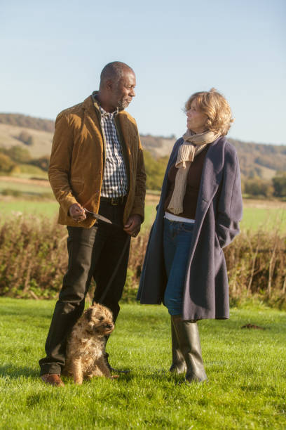 istock Mature couple with small dog 1204651458