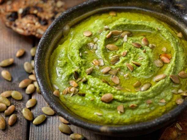 istock Avocado and Chick Pea Hummus with Veggies and Crackers 1204652024