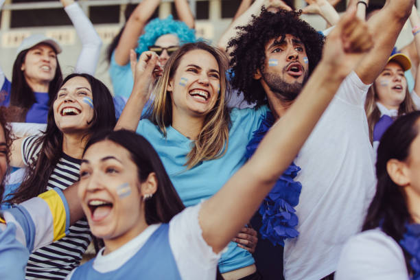 istock Argentina football supporters cheering for their team 1204653224