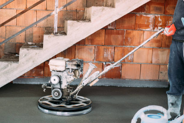 istock Power trowel tool. Construction Industry details. Helicopter concrete floor finishing on construction site 1204653237