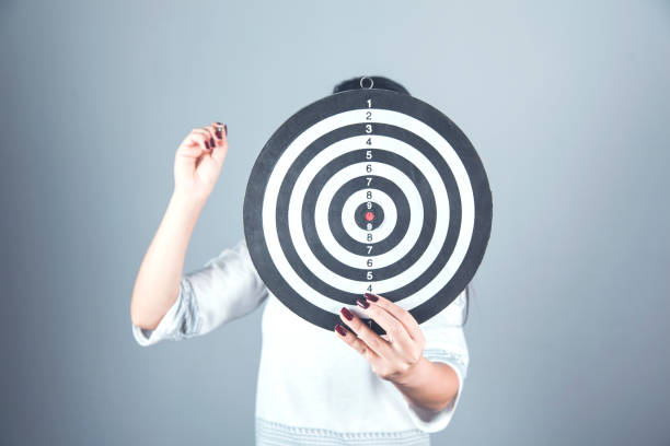 istock woman hand arrow target 1204655500