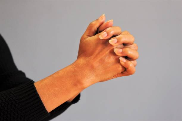 istock Women hands praying photo 1204659895