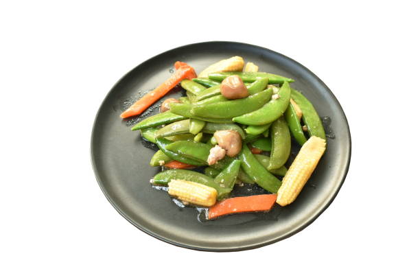 istock stir fried garden pea with straw mushroom and baby corn 1204659962