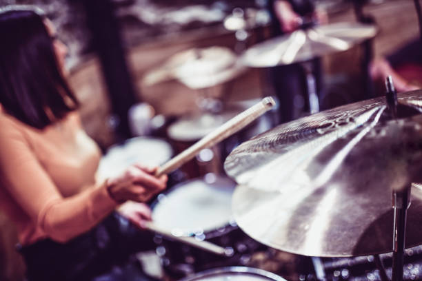 istock Drum Practice Session For Female Drummer 1204663483