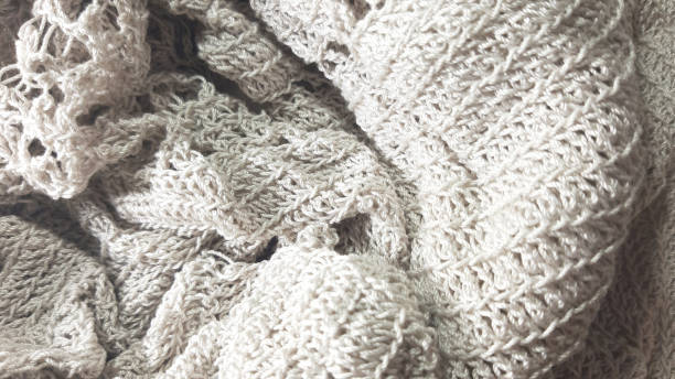 istock Light coloured knitted texture, fiber photo background. Fashion pattern modern, backdrop surface empty color 1204664615