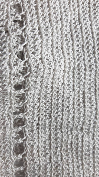 istock Light coloured knitted texture, fiber photo background. Fashion pattern modern, backdrop surface empty color 1204664625