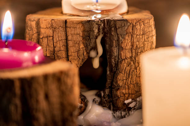 istock lighted candles with ornate wood and scented and energetic incense 1204664829
