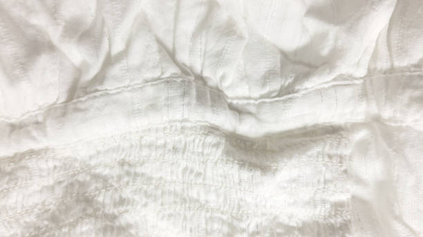 istock White fabric texture, fiber photo background. Fashion pattern modern, backdrop surface empty color 1204664871
