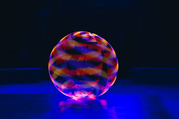 istock Colorful neon circle on black background 1204665285