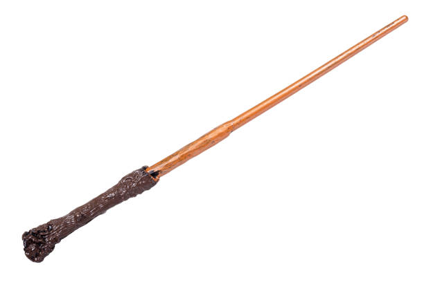 Wooden magic wand, wizard and magician tool. Isolated on white background.