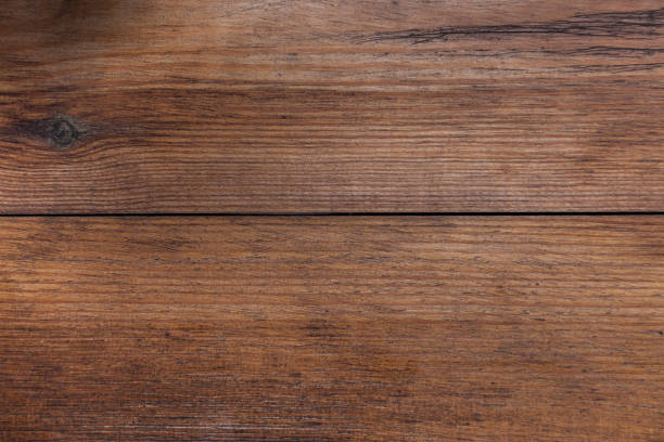 istock Wooden brown textured desk or table. Wooden texture table 1204668066