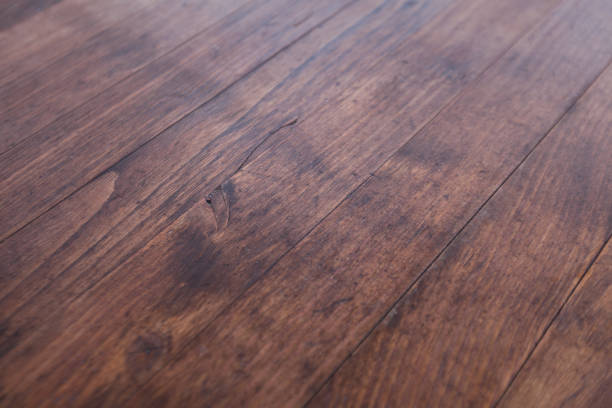 istock Wooden brown textured desk or table. Wooden texture table 1204668743