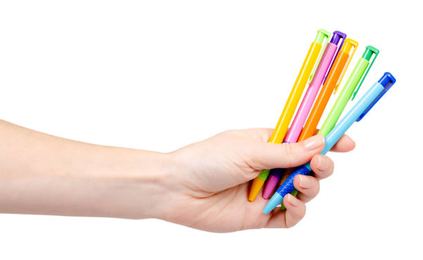 istock Colored pens, school or office accessories. Isolated on white. 1204670666