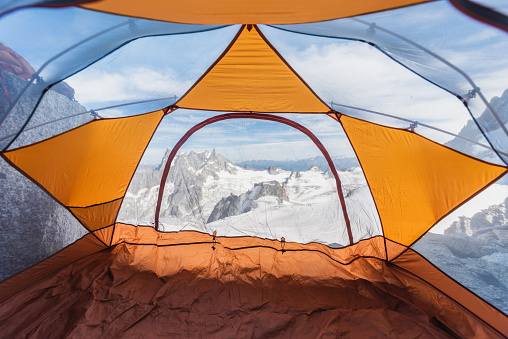 View of the Alps from inside a tent