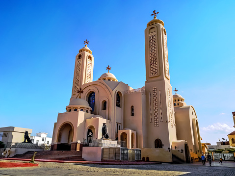 Egypt, Sharm El Sheikh - January 18, 2020: Main entrance to the El sama Eyeen Coptic Church in Sharm El Sheikh, outside view. Beautiful modern christian temple in arab city