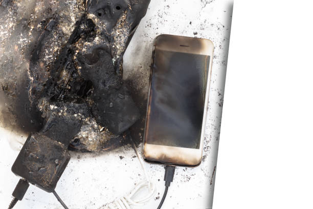 istock the burned-down power supply, phone, possible cause of the fire 1204682074