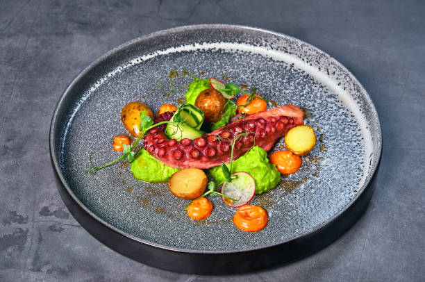 istock plate with fresh seafood on the table 1204684740