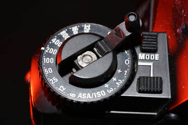 This is a setting wheel for ISO and aperture on an old camera photographed in the studio