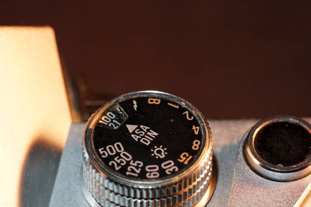 istock Setting wheel for ISO and aperture on an old camera photographed in the studio 1204687910