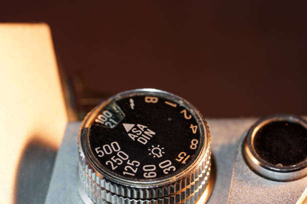istock Setting wheel for ISO and aperture on an old camera photographed in the studio 1204688843