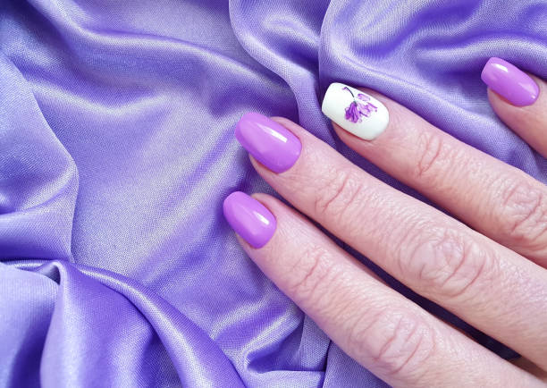 istock female hand beautiful nail manicure silk 1204689295