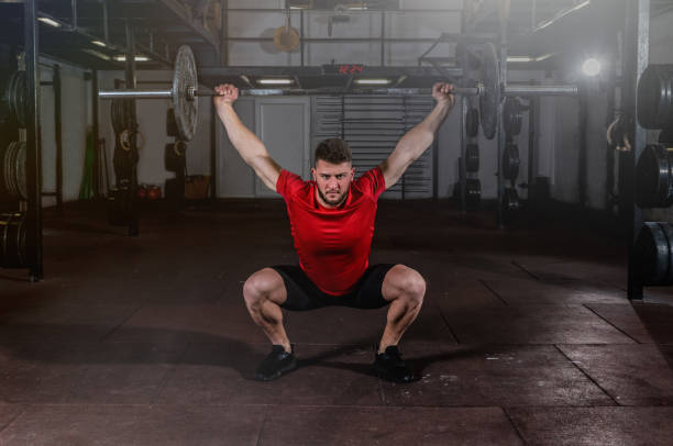 istock Fit and Strong Young Man Preparing for Dead Lift Workout 1204690027
