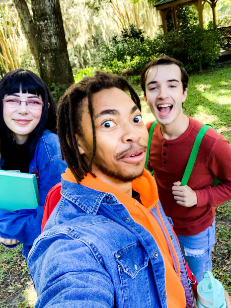 istock Group of university students take a selfie making funny faces 1204694328