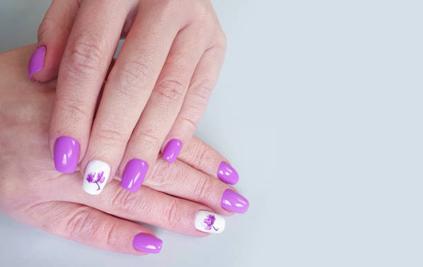 istock female hand beautiful nail manicure 1204694573