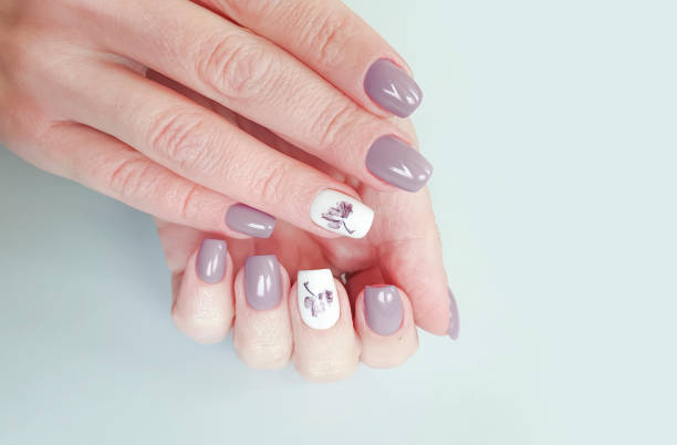 istock female hand beautiful nail manicure 1204695932
