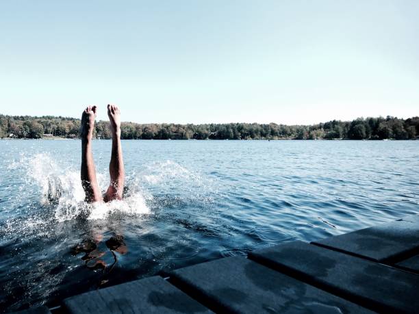 istock Water Play, Swimming, Diving, Jumping in Lake 1204697957