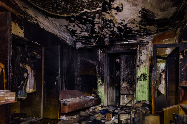 istock Burnt old rural house interior. Consequences of fire 1204702318