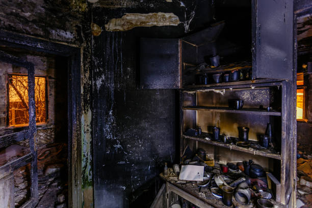 istock Burnt old rural house interior. Consequences of fire 1204702322