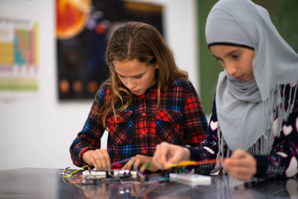 istock Elementary Girls Working on a STEM Project stock photo 1204702650