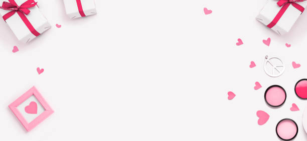 istock Valentines day, wedding, engagement flat lay top view pink banner. Present gift box, ribbon, pink hearts, picture frame 1204716340