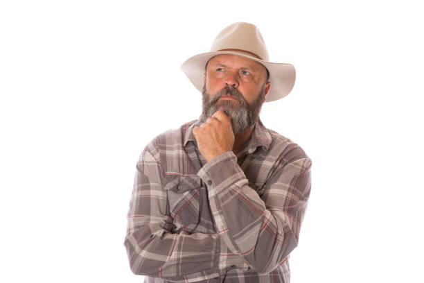 A man in his fifties with a thoughtful expression, planning or thinking.