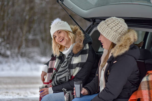 istock two friends going on winter holiday 1204722490