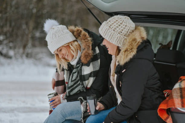 istock two friends going on winter holiday 1204722505