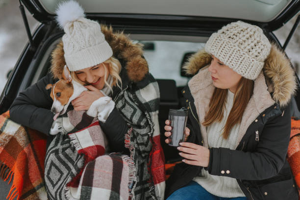 istock two friends going on winter holiday 1204722541