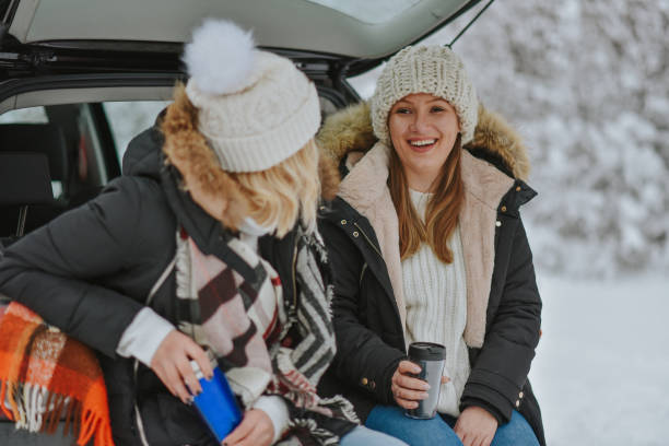 istock two friends going on winter holiday 1204722543