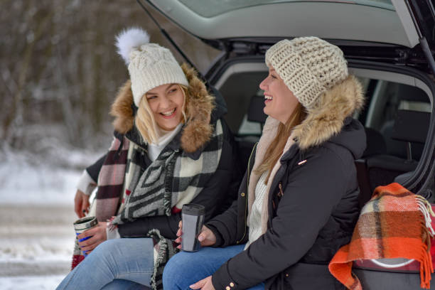 istock two friends going on winter holiday 1204722546