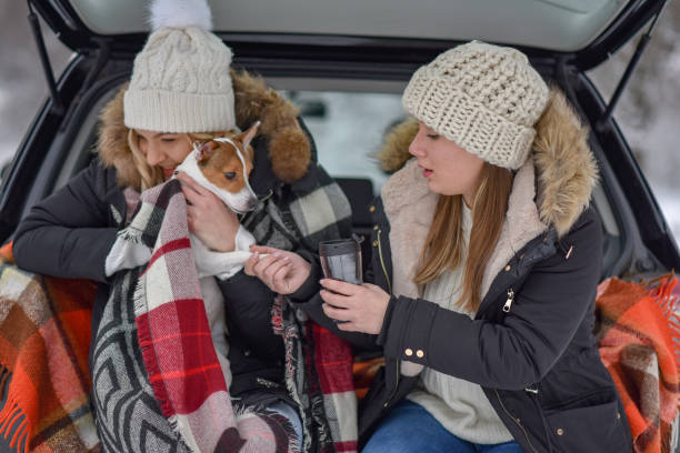 istock two friends going on winter holiday 1204722602