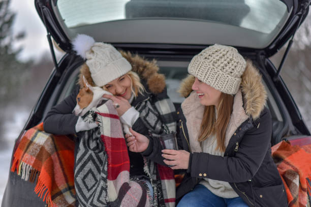 istock two friends going on winter holiday 1204722603