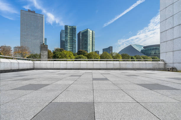 istock empty brick floor with cityscape and skyline 1204730379