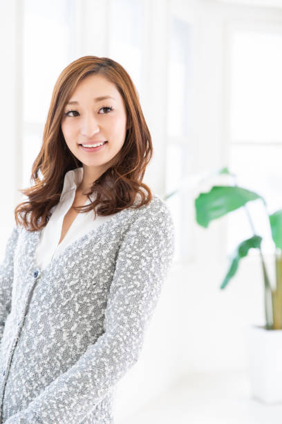 istock asian woman relaxing 1204732549