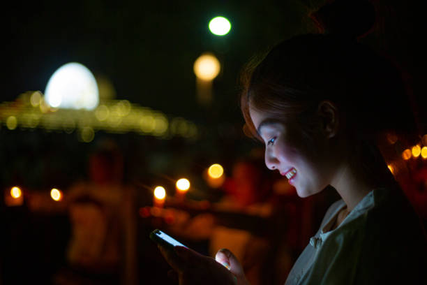 istock Asian woman using smart phone i 1204736347