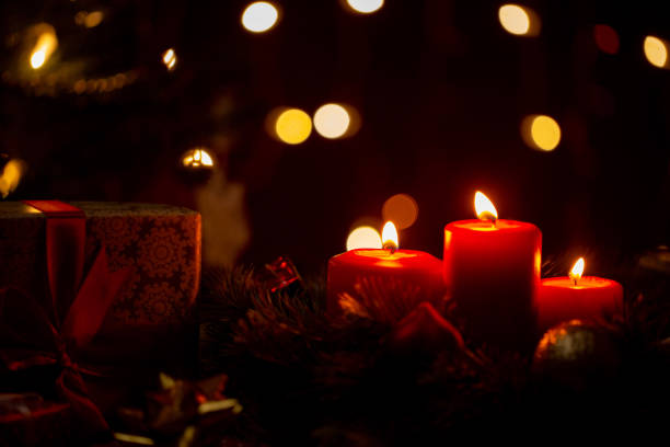 istock Christmas red candle decoration 1204737597