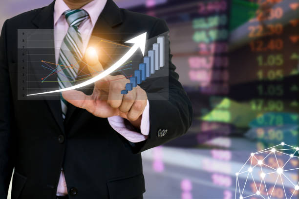 istock Business people graph analysis concept Company profits With technology 1204740349